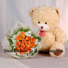 Bunch Of 12 Orange Roses And A Medium Sized Cute Teddy Bear Delivered in Hong Kong