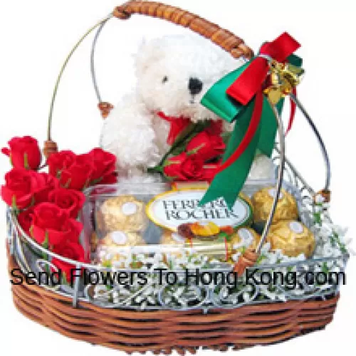 Un magnifique panier composé de roses, 16 pièces de Ferrero Rocher et un mignon ourson blanc