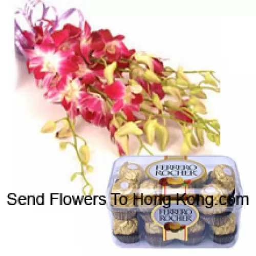 Bouquet d'orchidées roses avec des remplisseurs saisonniers et 16 Ferrero Rochers.