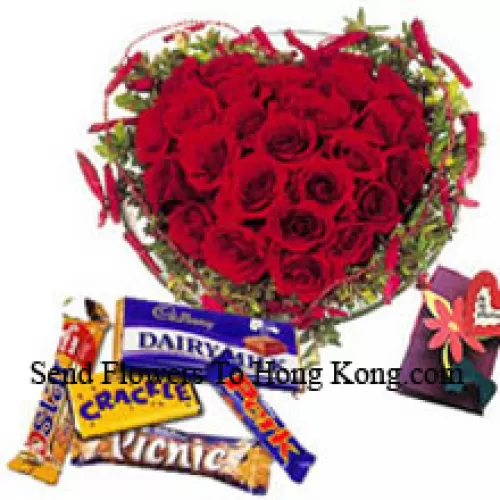 Heart Shaped Arrangement Of 40 Red Roses, Assorted Chocolates And A Free Greeting Card