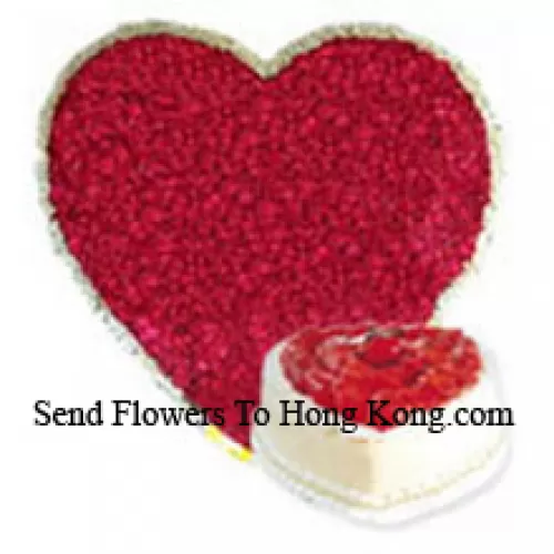 Heart Shaped Arrangement Of 200 Red Roses Along With Heart Shaped Pineapple Cake