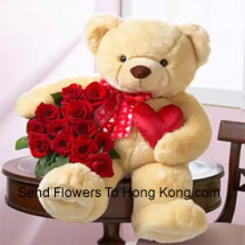 Bunch Of 12 Red Roses With A 28 Inches Tall Teddy Bear (Please Note That We Reserve The Right To Substitute The Teddy Bear With A Teddy Bear Of Equal Value And Size In Case Of Non-Availability Of The Same. Limited Stock. While Substituting The Product We Will Ensure That The Same Exclusivity Is Maintained)