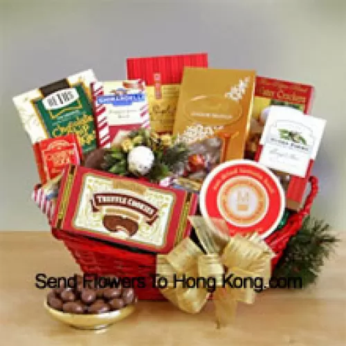This handsome red oval basket comes decorated with a big bow to make a great presentation. Inside are many reasons to smile as he sample the savory and sweet selection: crackers, cheese, Cashew Roca, truffle cookies, mocha almonds, chocolate chip cookies, Lindt truffles, Ghirardelli almond chocolate bar, and English tea cookies. (Please Note That We Reserve The Right To Substitute Any Product With A Suitable Product Of Equal Value In Case Of Non-Availability Of A Certain Product)