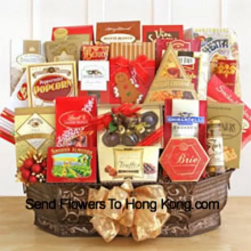 When you absolutely must make a memorable impression, this extravaganza gift basket is just the thing. It's one of the largest designs we've ever created, and it's packed with so many different gourmet goodies it's almost impossible to list them all. There's plenty inside to sample, share, and share some more. We pack it all inside a gorgeous metal container that they can reuse once they manage to complete all that eating. Your lucky recipient will find Jacquot truffles, Harry & David's Moose Munch, Berry bon bons, Sonoma biscotti, chocolate chip cookies, Bellagio hot cocoa, cookies, Ghirardelli chocolate squares, Cashew Roca, bruschetta toast, Brie cheese, olives, merlot cheddar cheese, smoked salmon, sesame crackers, classic water crackers, and a box of Le Grand truffles. (Please Note That We Reserve The Right To Substitute Any Product With A Suitable Product Of Equal Value In Case Of Non-Availability Of A Certain Product)